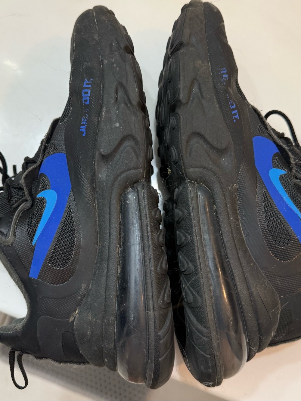 Nike Women’s Black Sneakers with Blue Swoosh